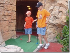Matt and Andrew playing golf